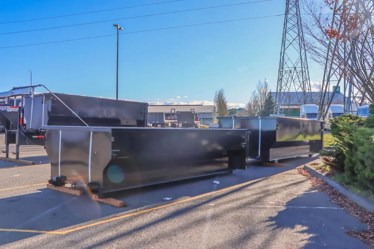 Roll-off dumpster ready for waste disposal at job site for Demolition Dumpster Rental in Pharr